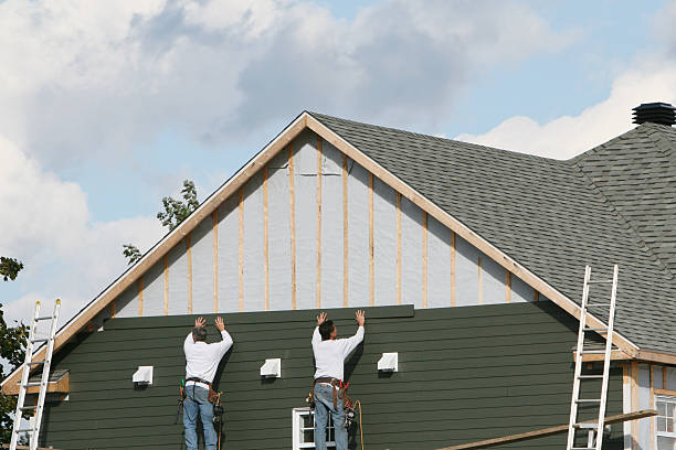 Professional Emergency Siding Repair technician working in Ashland, PA
